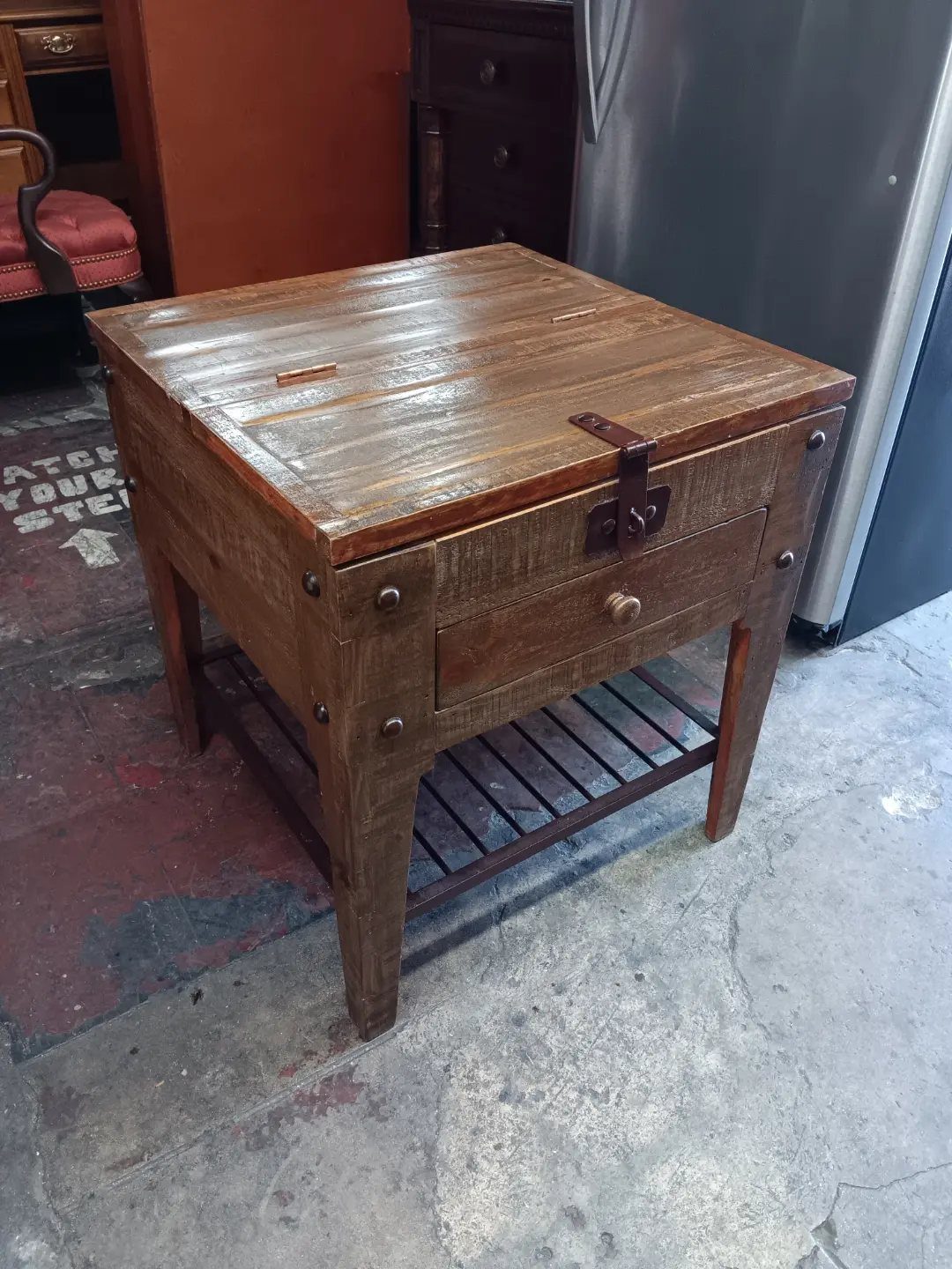 Rustic wooden end table with a leather strap lid and a small drawer