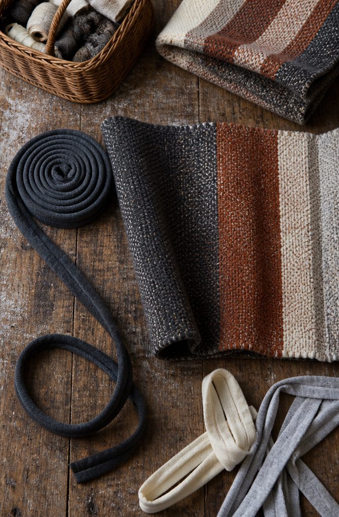 Fabric strips gathered for a braided rug project