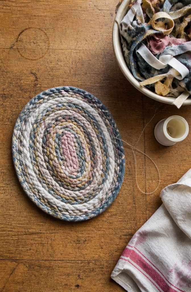 How to Sew a Rug: 9 Steps for Cotton Piping and Fabric Rugs 7 Coiled fabric braid with stitching joining the rows